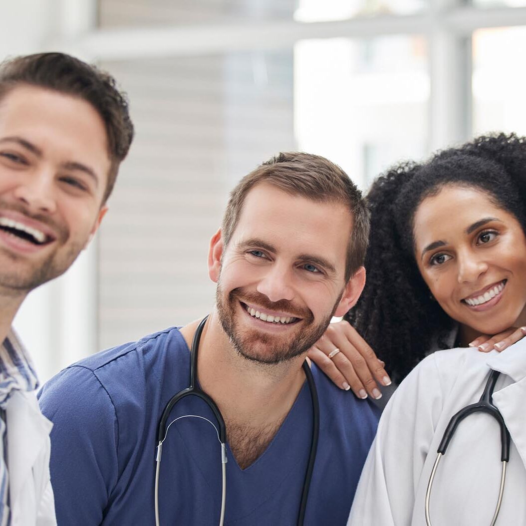 Doctor, selfie and group with smile for social media and profile picture in hospital. Healthcare, nurse staff and clinic with teamwork, collaboration and happy smile from medical work and employees.